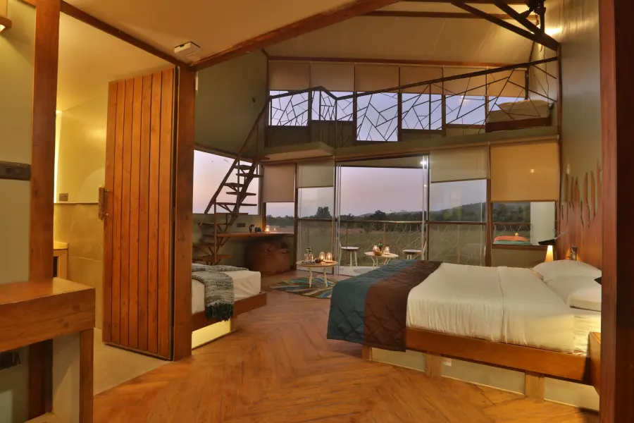 Room finished in stone and reclaimed wood at a luxury stay