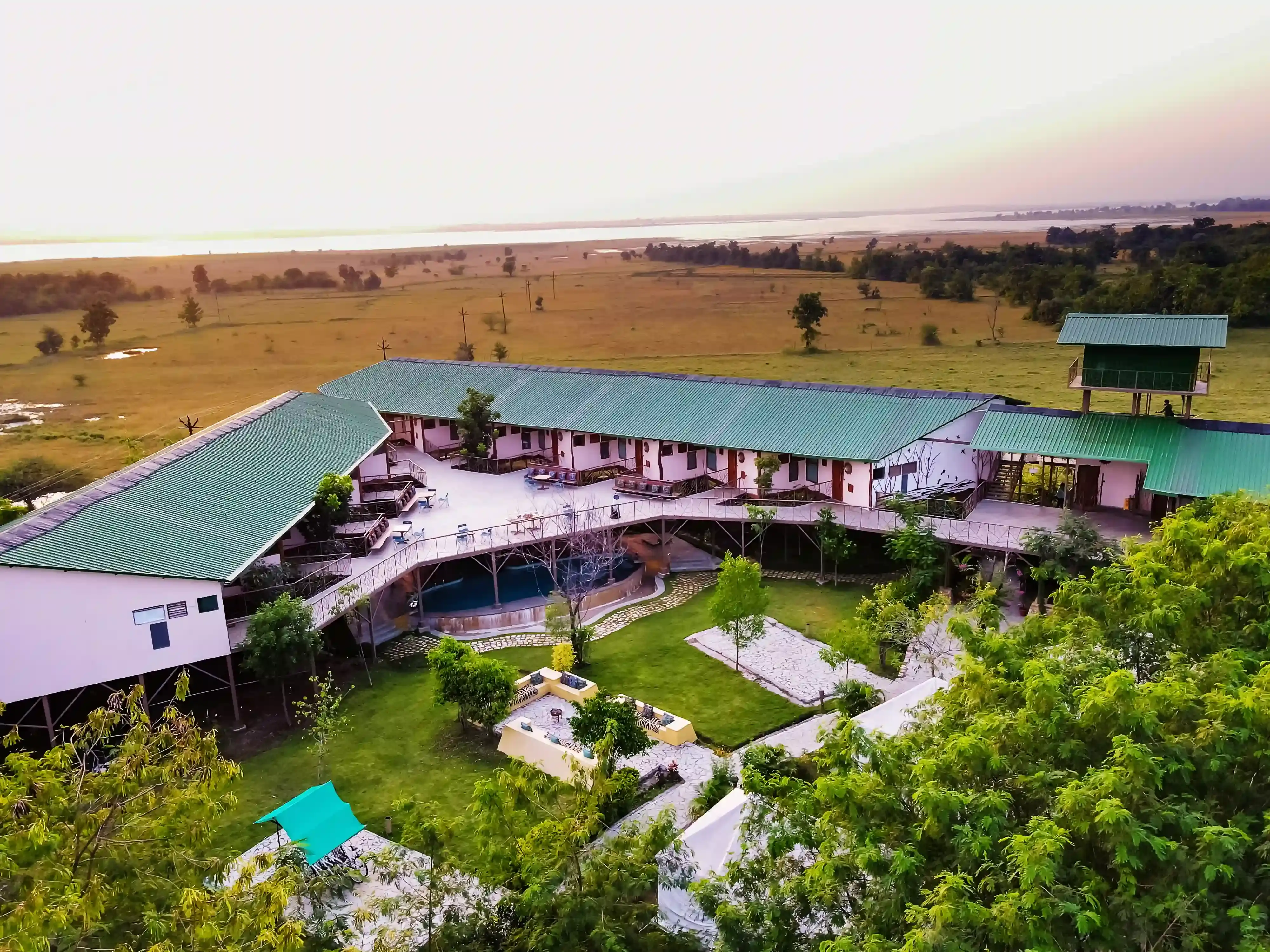 Aerial view of a lodge at the forest edge