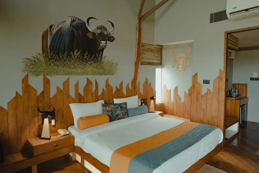 Room finished in stone and reclaimed wood at a luxury stay