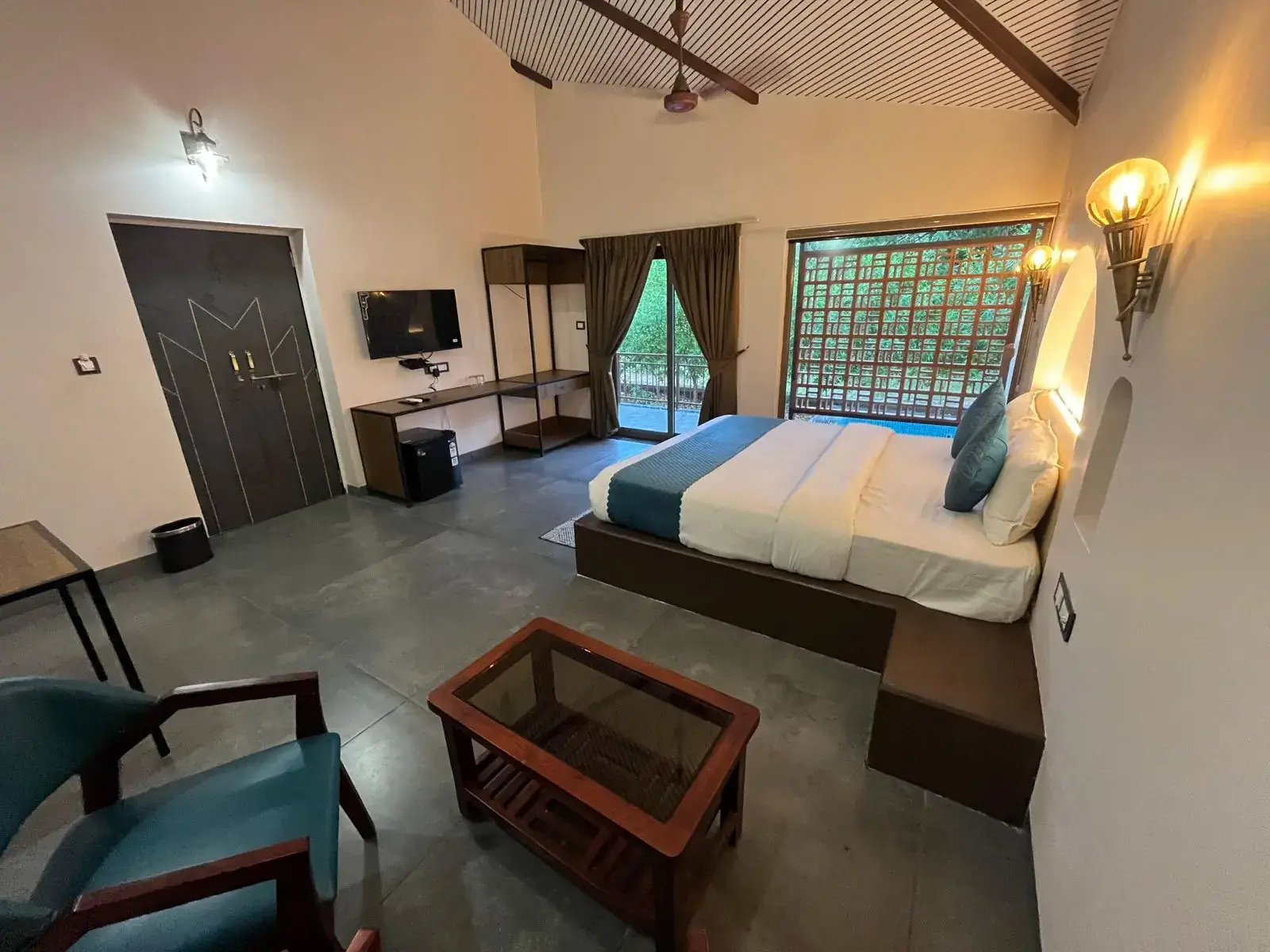 Simple cottage room near a Pench gate