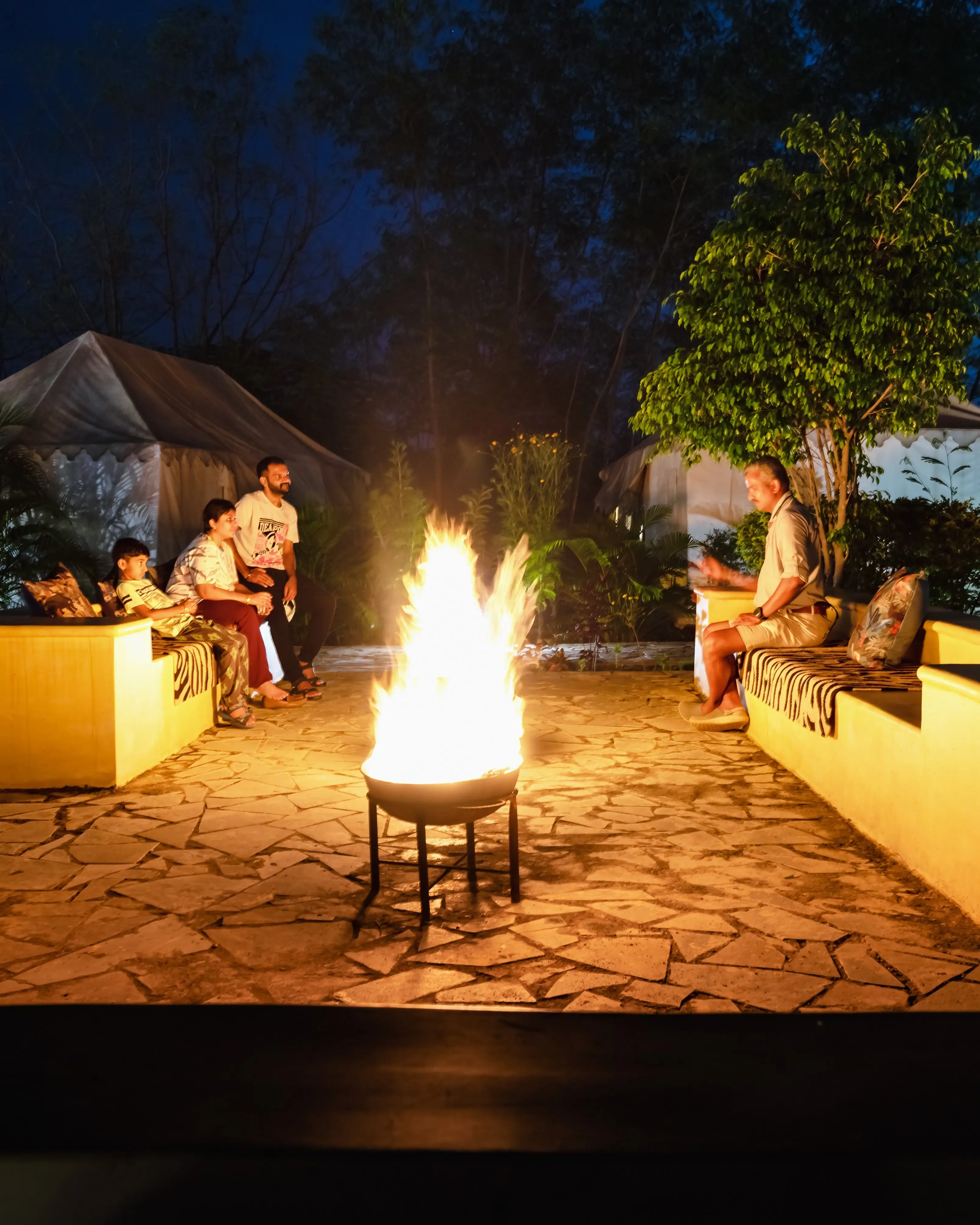Family bonfire evening at a Tadoba resort